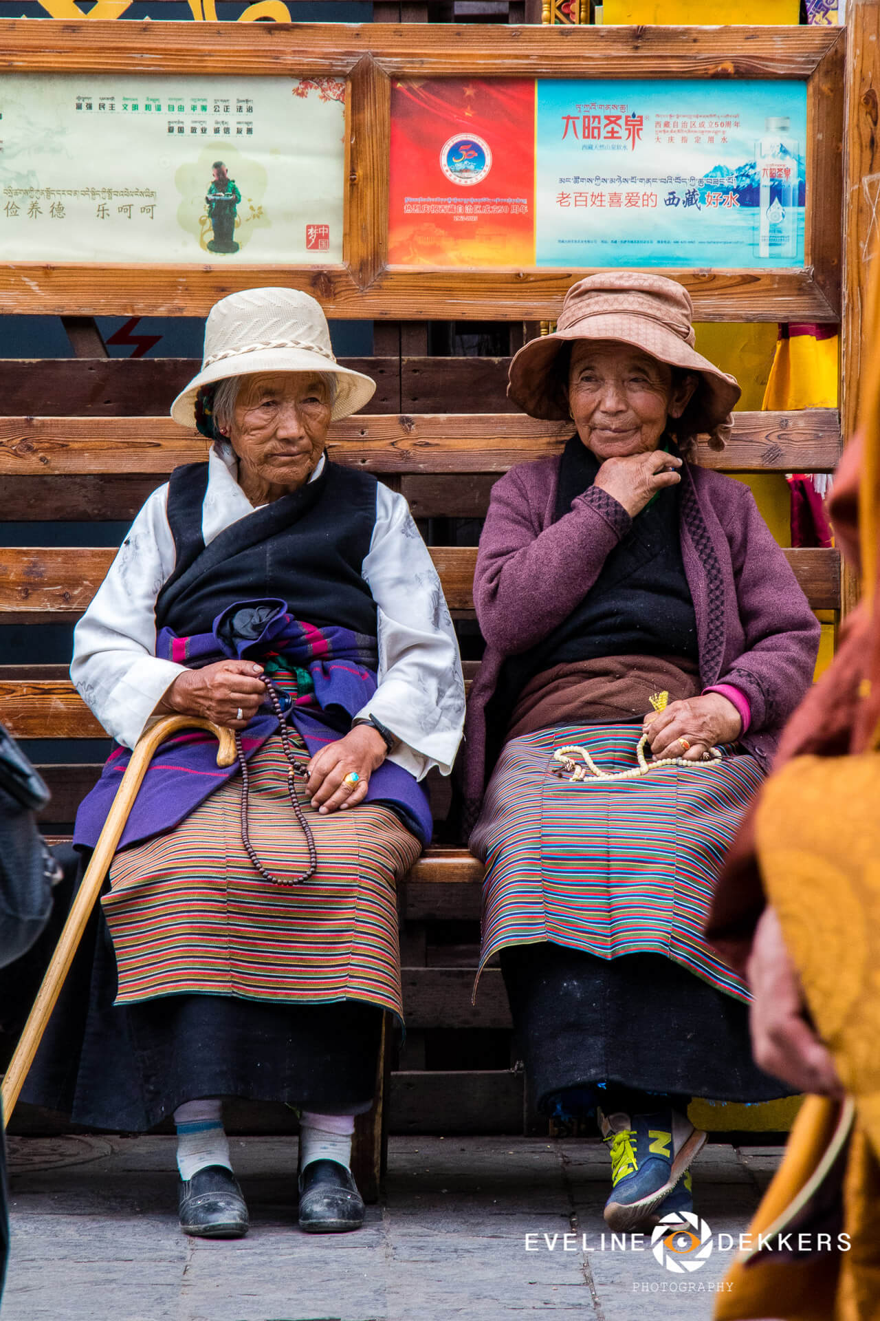 Pilgrims resting at the Barkhor Circuit - Tibet